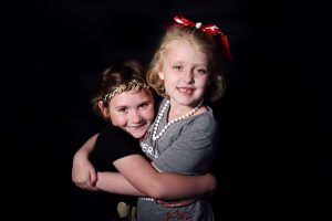 The Mollies share a hug at the 2017 University of Alabama Dance Marathon.