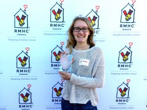 Ariana White poses with her award.