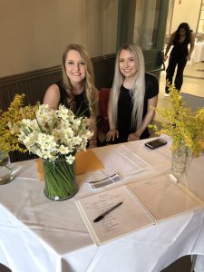 Members of the ADPi Zeta Eta Chapter greet guests.