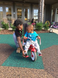 Demarius Hollis and Cade Hollis enjoy the playground.